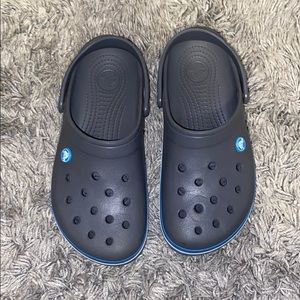 Gray and blue crocs in perfect shape